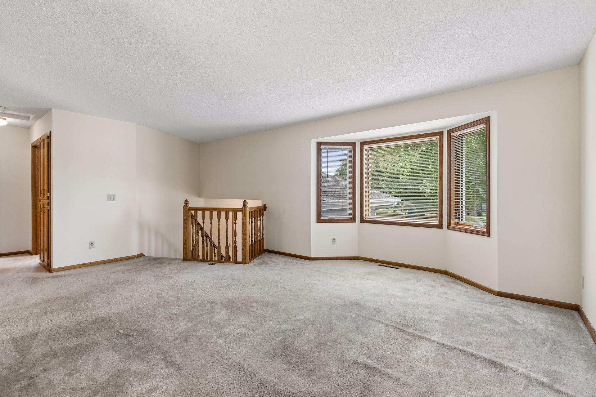 Bay window at the front. Neutral walls throughout the home.