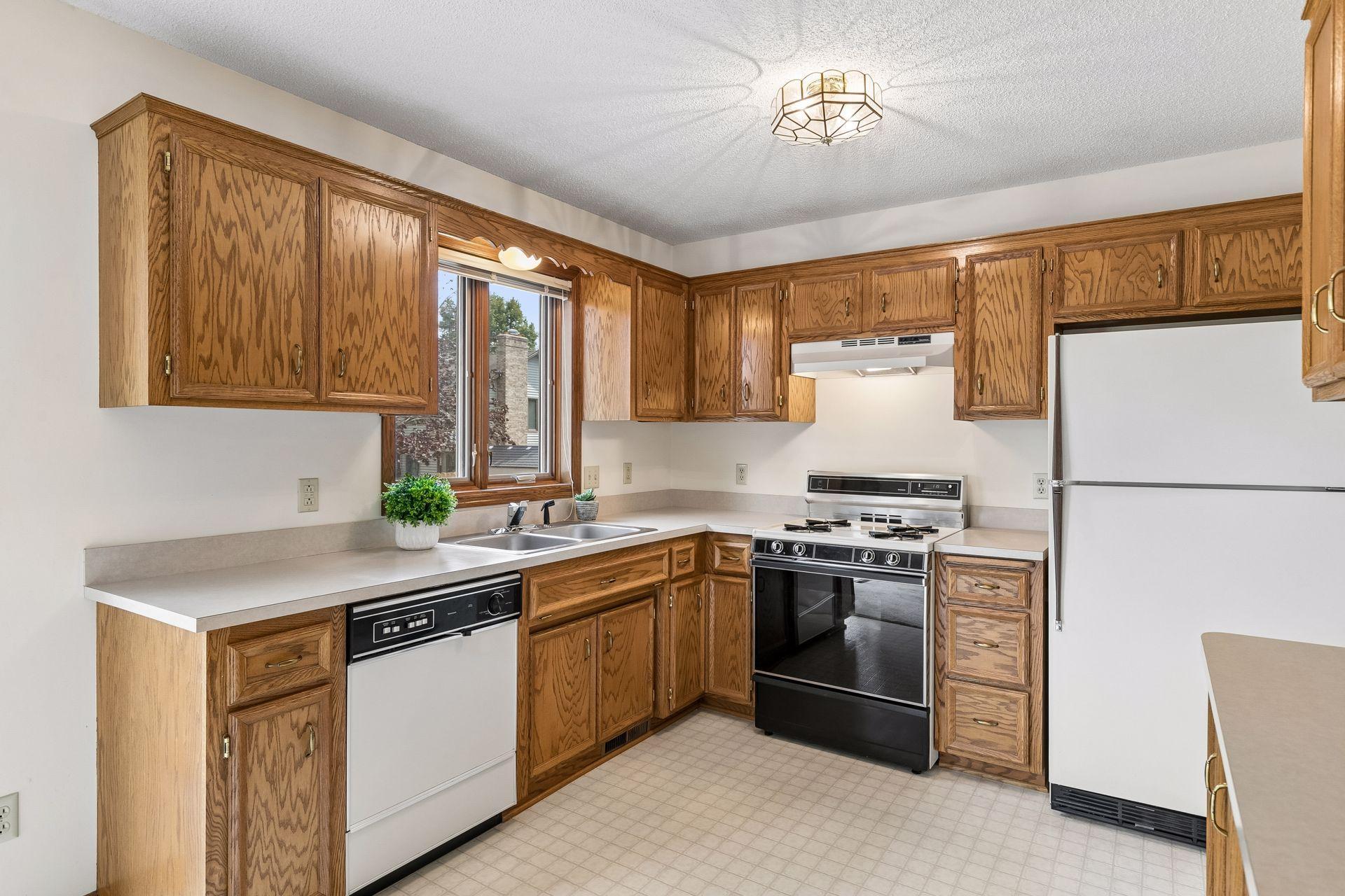 A kitchen with a great layout and tons of cabinets.