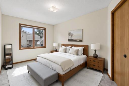 Virtually staged second bedroom on upper level.