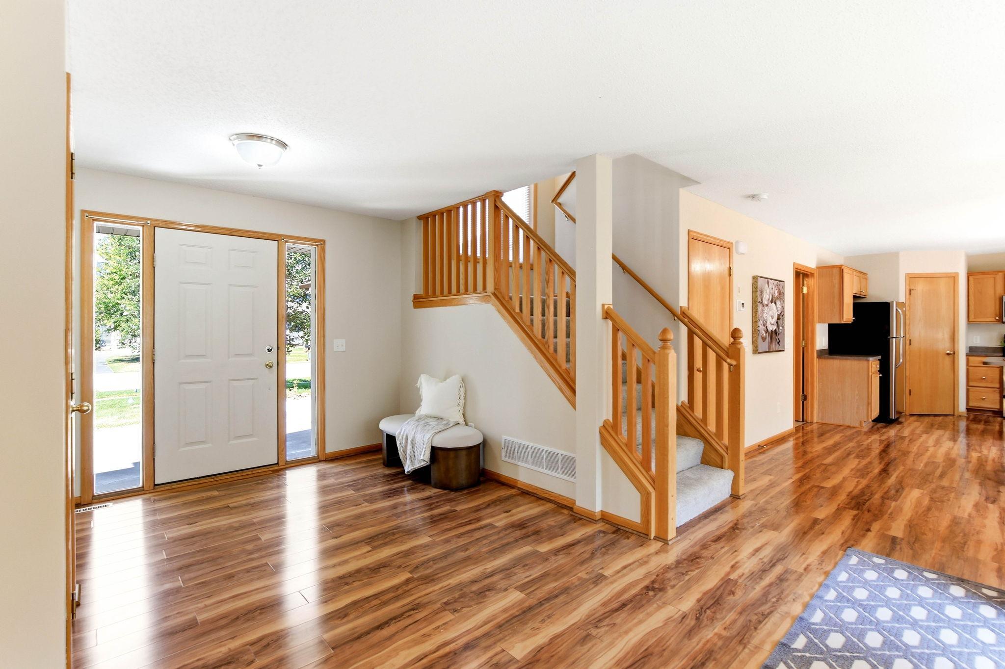 OPEN FOYER WITH NATURAL LIGHTING