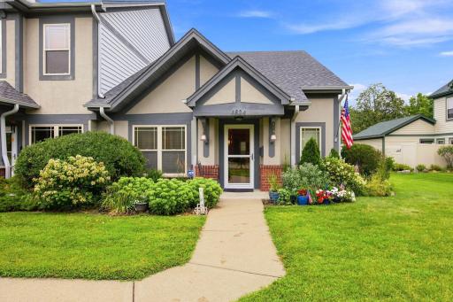 End unit surrounded by perennial gardens