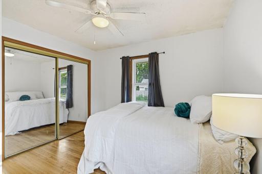 The mirror closet gives extra dimension to bedroom #3 while reflecting the light.