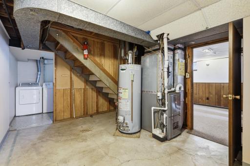 The extra storage area is located by the laundry room.