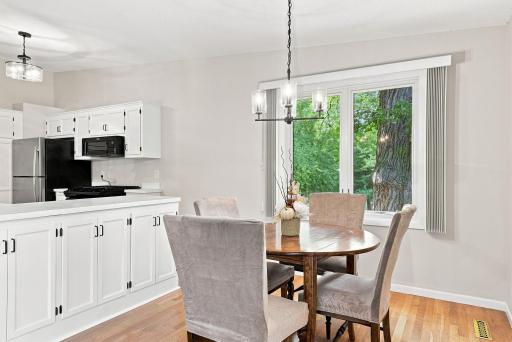 You can see the kitchen from this angle. Notice the updated and sytlish features.