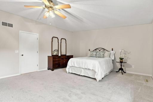 Another view of the primary bedroom.
