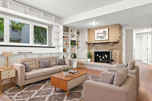 Virtually staged photo of family room in lower level