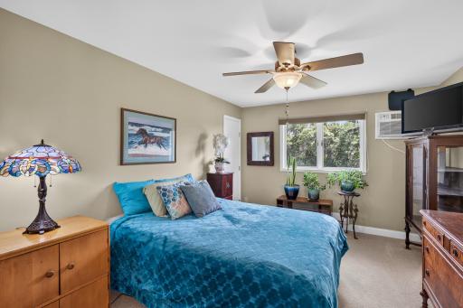 Large primary suite with ensuite bathroom and two walk-in closets.