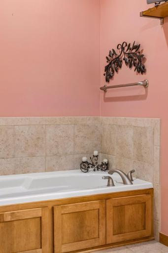 Enjoy a warm, relaxing bath in the soaking tub.
