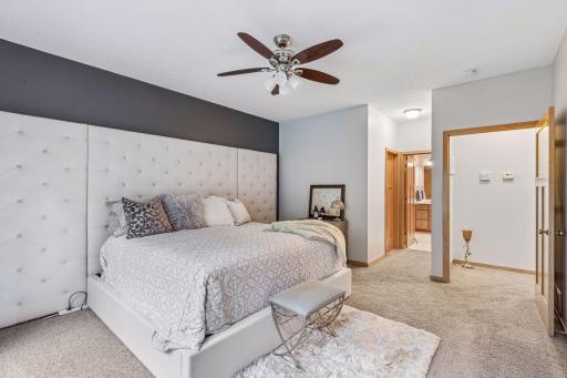 The primary bedroom includes an ensuite walk-in closet and full bath.