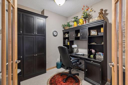 Office space with cabinets/desk included.