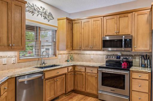 The kitchen window brings the east sun into your morning coffee time.