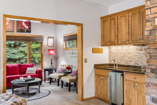 Just off the living room is the welcoming sunroom.