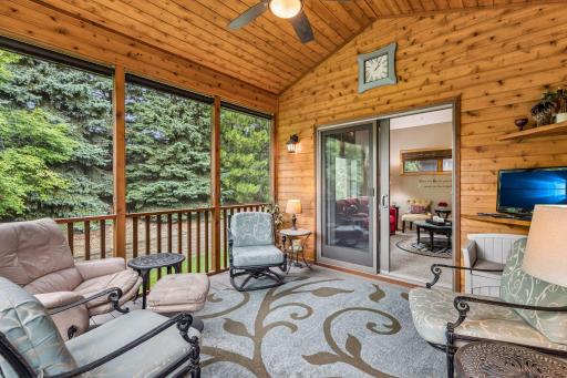The sunroom leads to the screened porch for additional entertaining space.