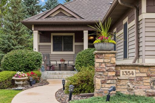 Steel siding with stone and cedar accents on the exterior