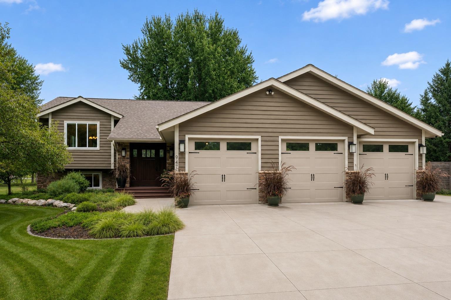Welcome to 947 Sherman Road. Beautiful curb appeal and quality upgrades and design throughout! Photo digitally enhanced.