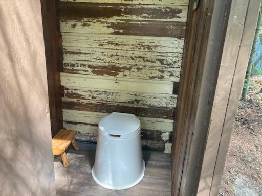 Toilet in outhouse