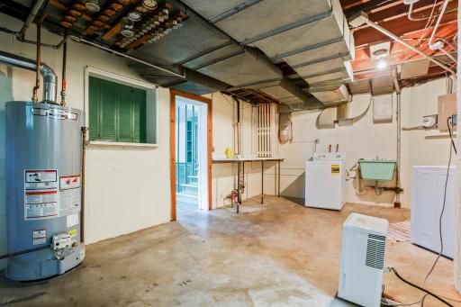 Laundry, Hobby, and Storage Rooms: This laundry room is home to a Speed Queen washing machine (commercial-grade) and dryer.