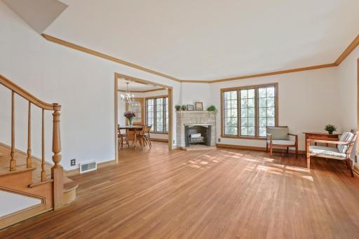 Living room - Mid-Century Modern Design: âBringing the outside insideâ is a theme throughout this home. The inside of this home is freshly painted and feels light and airy.
