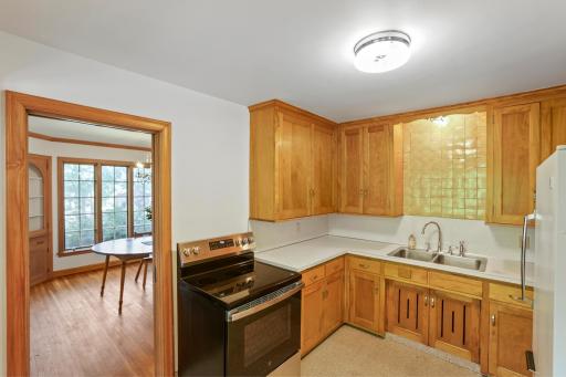 Kitchen - These solid birch kitchen cabinets are in excellent condition and have been freshly painted on the inside. The oven is brand new and has never been used.