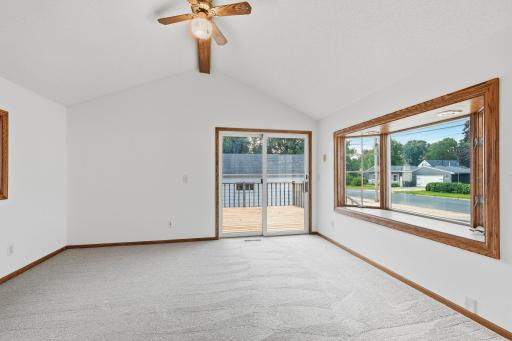 Family room with vaulted ceilings and excellent sunlight exposure
