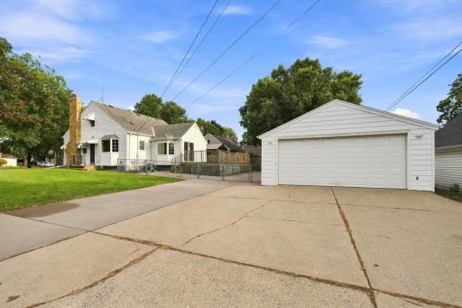 Rare find 4 car garage with bonus parking