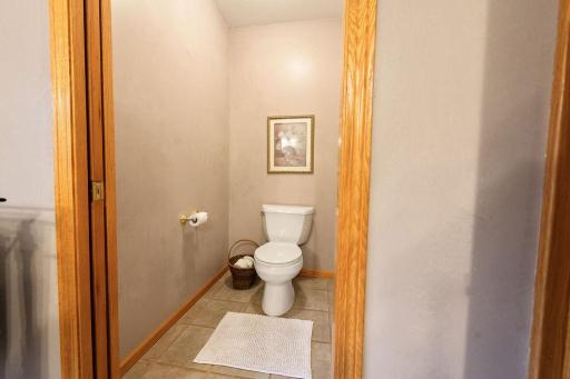 spacious water closet in primary bathroom