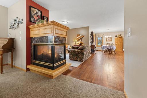 double sided fireplace between sitting room and living room