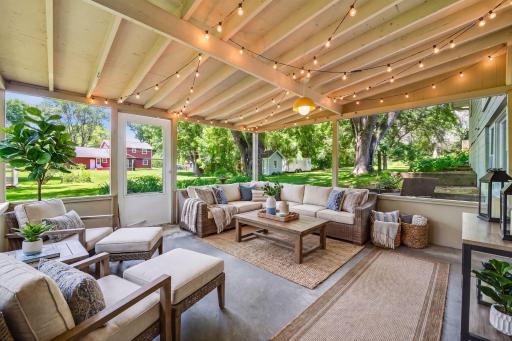 Relax inside this screened-in porch that steps out to a beautiful and flat backyard - *VIRTUALLY STAGED*