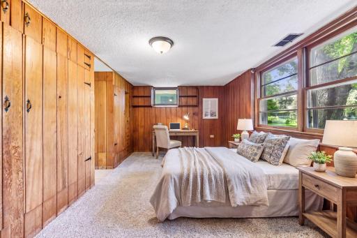 The lower fourth bedroom has an en-suite bath - *VIRTUALLY STAGED*