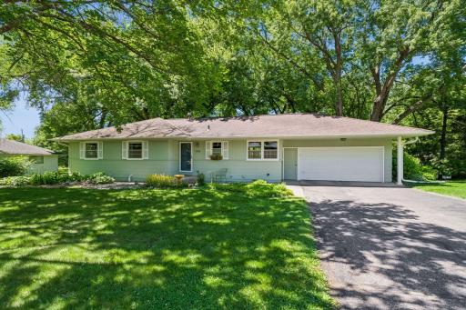 GREAT NEW PRICE - Charming rambler opportunity in the sought-after Woodland Hills neighborhood, within award-winning Minnetonka Schools!