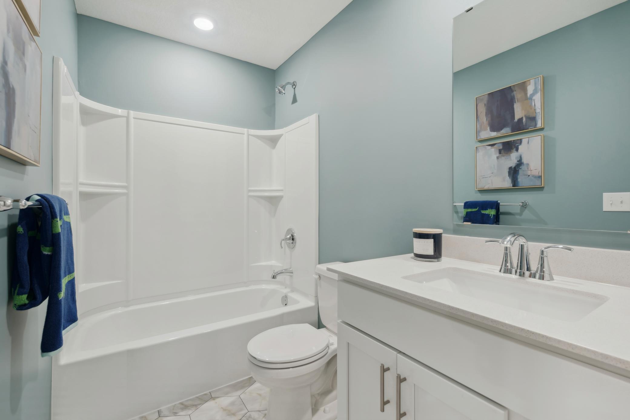 (Photo of a decorated model, actual homes finishes will vary) Upper level laundry has never made chores easier!