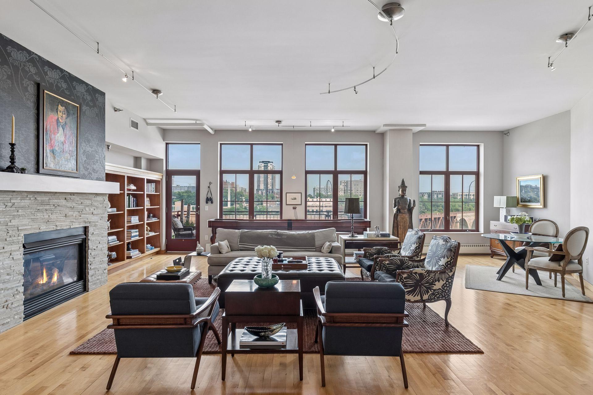 Great room — wall of windows, built-in shelving