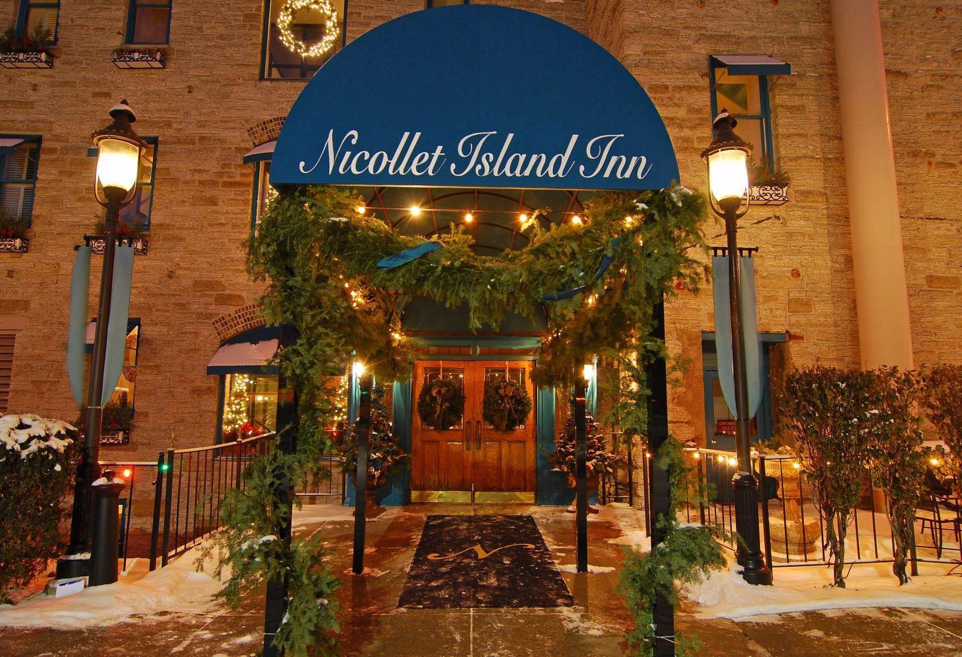 Nicollet Island Inn under holiday lights