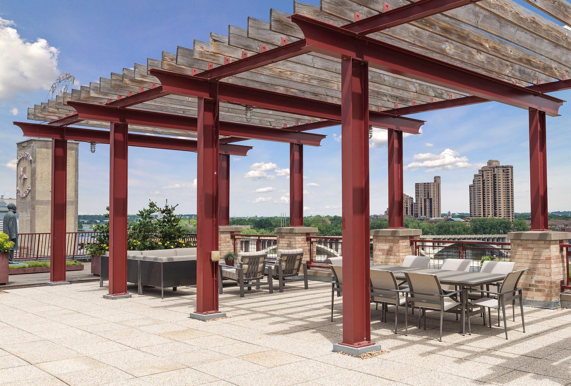 Rooftop dining under the pergola