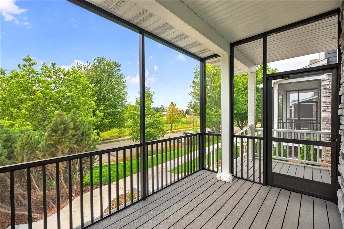 Sunny screened in porch on the front of the property.