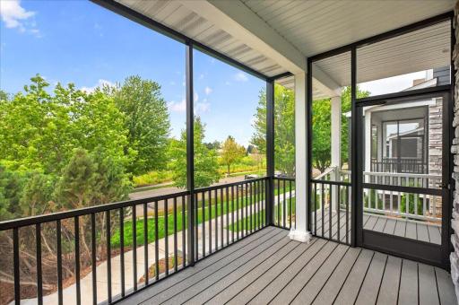 Sunny screened in porch on the front of the property.