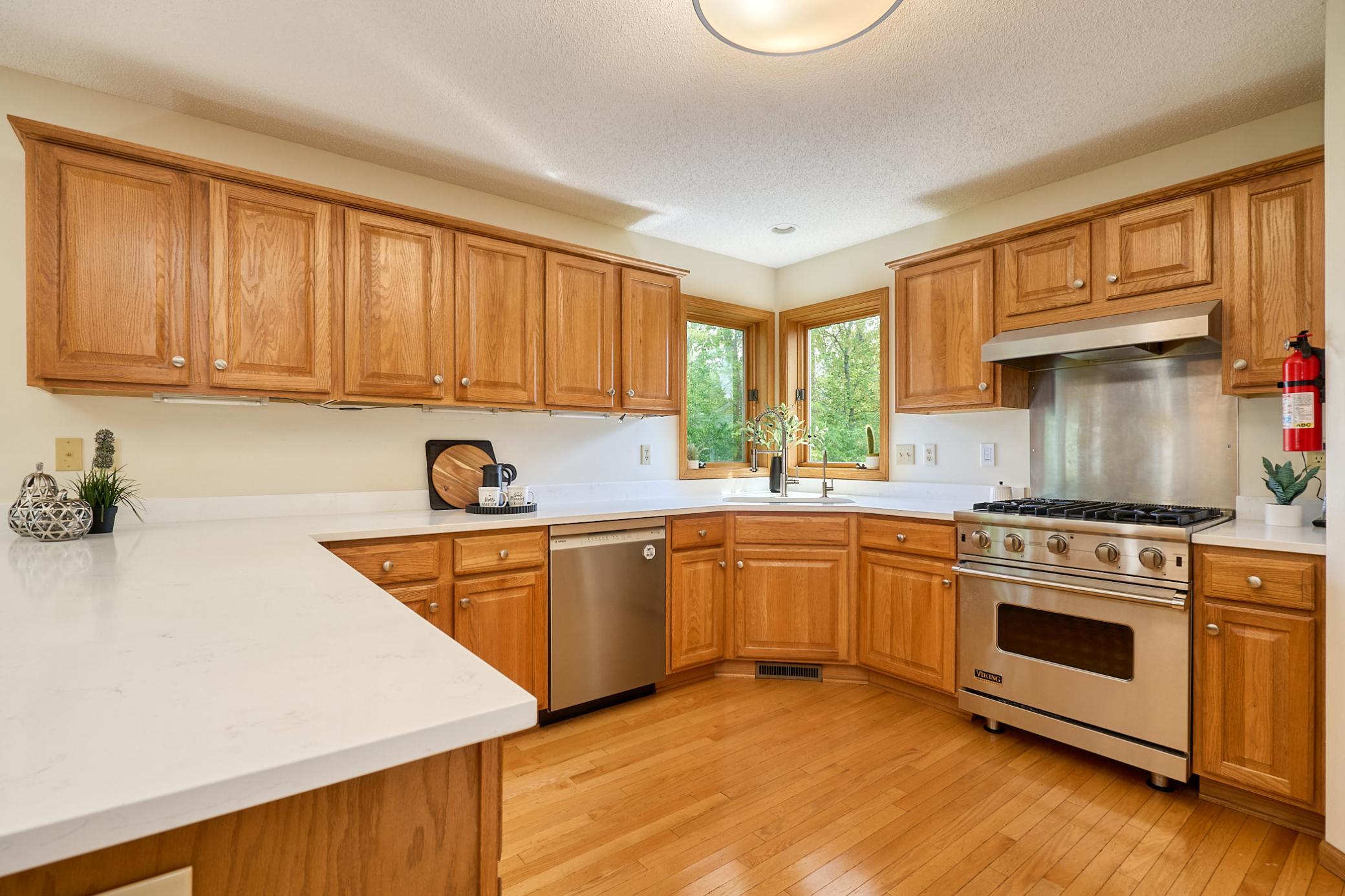 Spacious kitchen with plenty of cabinet space and new granite countertops