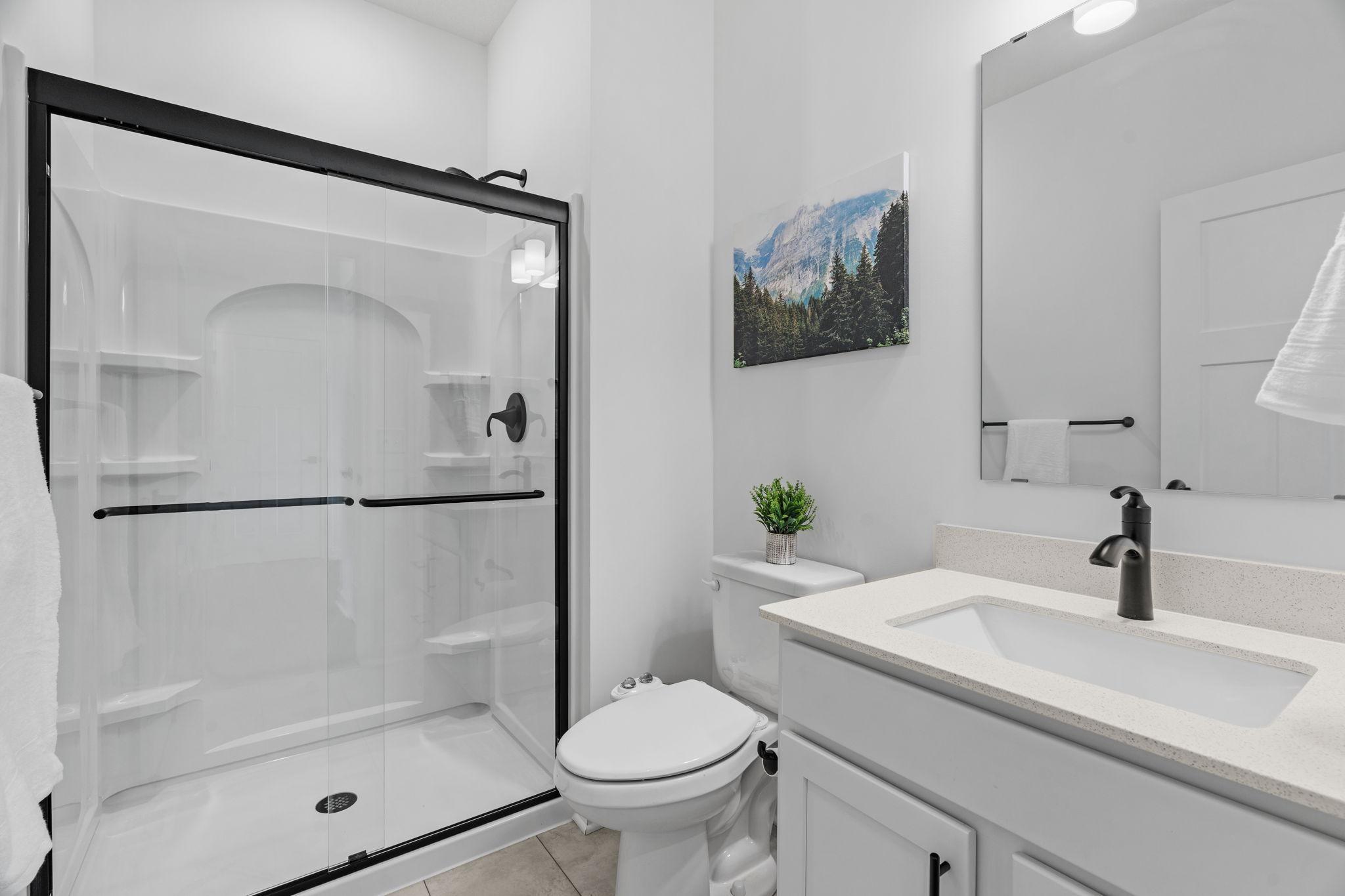 Main Level Bedroom/Office + 3/4 Bath