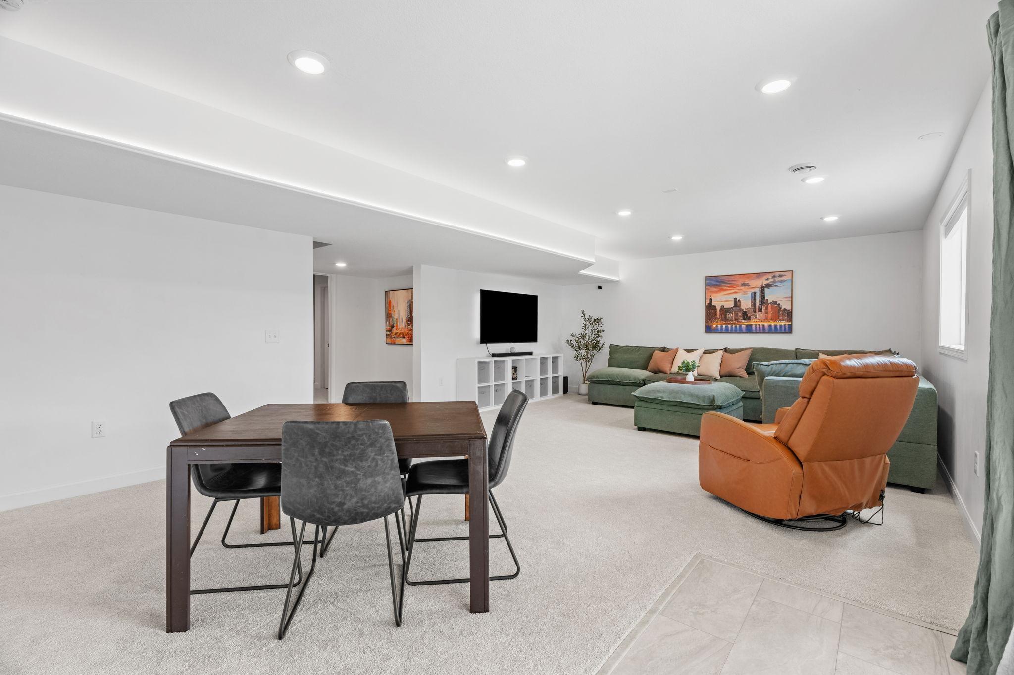 Finished walkout LL w/ tons of natural light, Living Room, addt’l Flex Room/Office, 5th Bed, Full Bath + Storage,