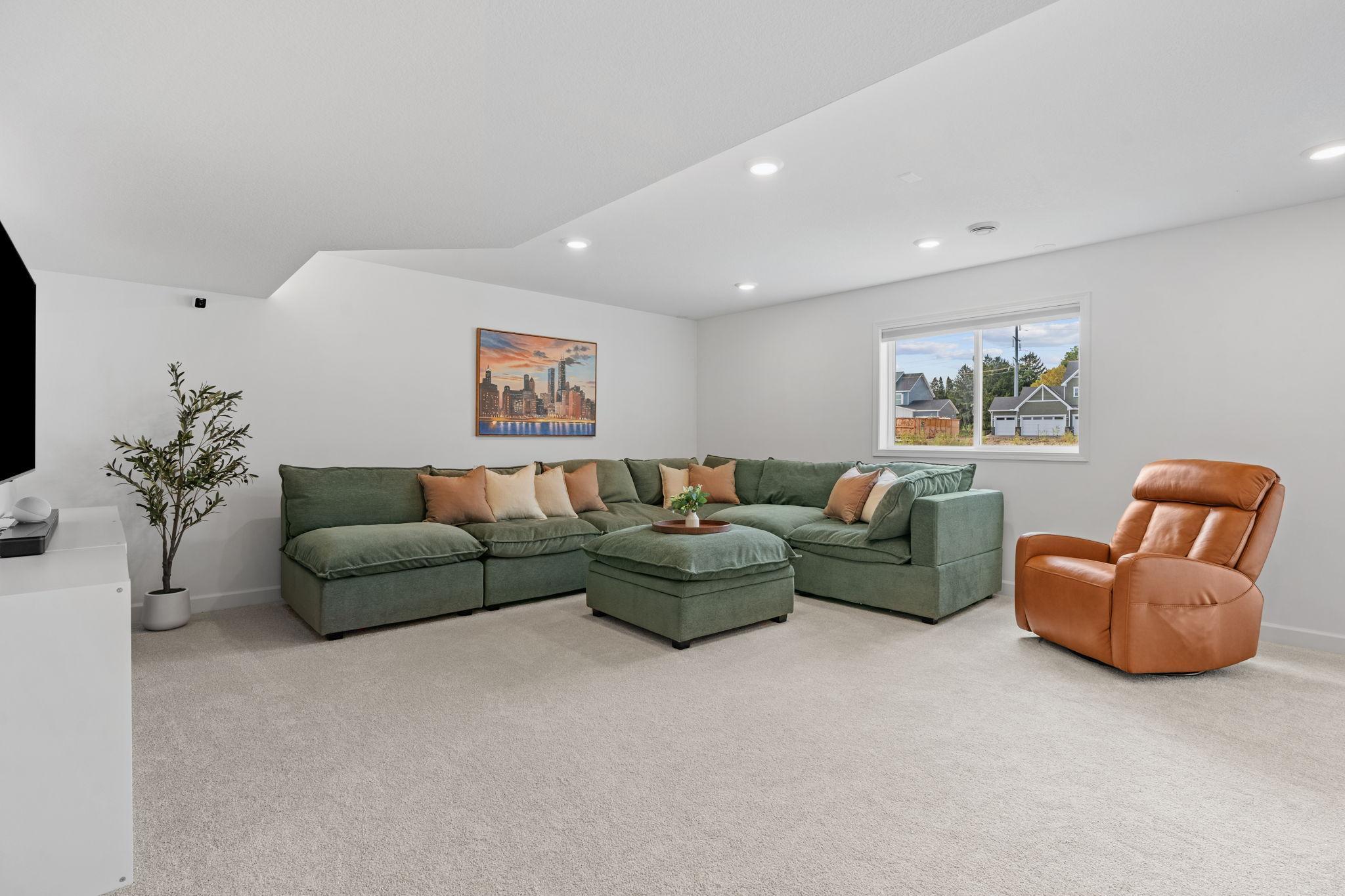 Finished walkout LL w/ tons of natural light, Living Room, addt’l Flex Room/Office, 5th Bed, Full Bath + Storage,