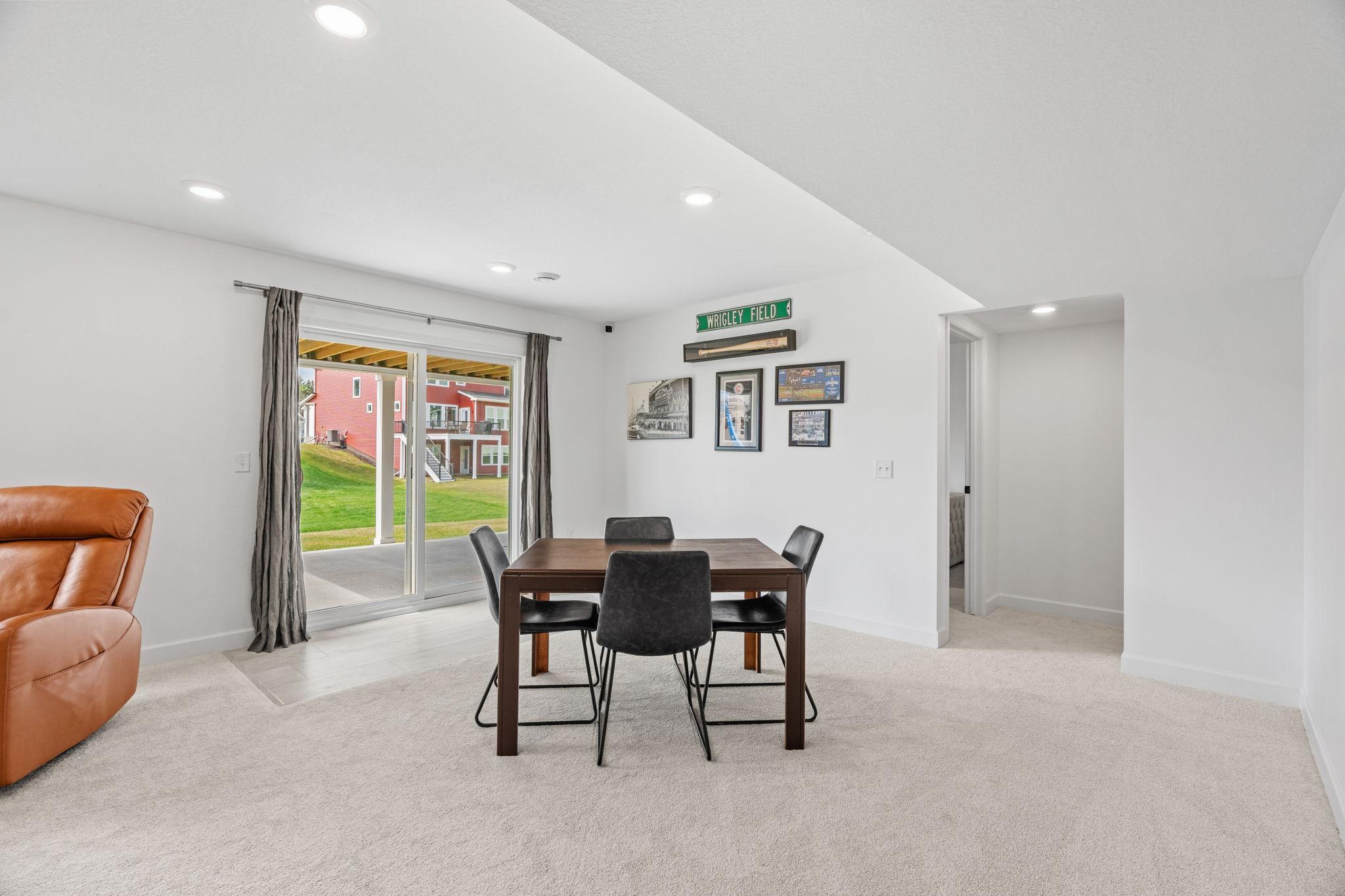 Finished walkout LL w/ tons of natural light, Living Room, addt’l Flex Room/Office, 5th Bed, Full Bath + Storage,