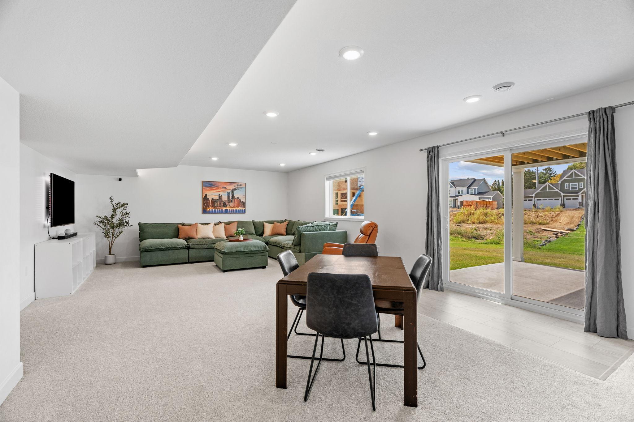 Finished walkout LL w/ tons of natural light, Living Room, addt’l Flex Room/Office, 5th Bed, Full Bath + Storage,