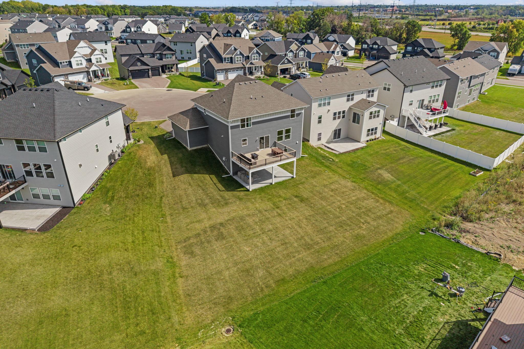 Walk out to newly added 17x20 TimberTech maintenance-free deck w/ lighting + drink rail.