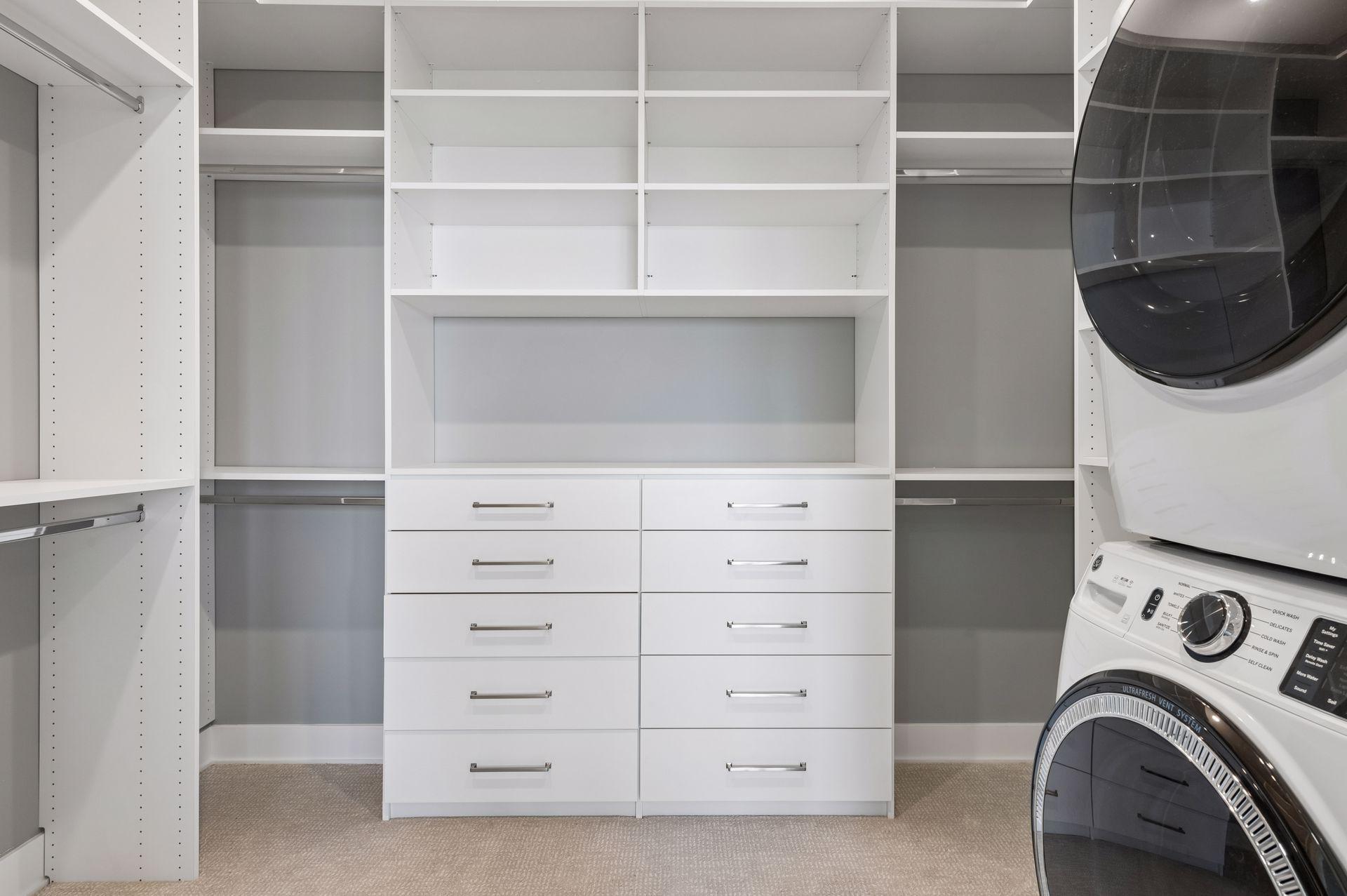 Master walk-in closet with laundry