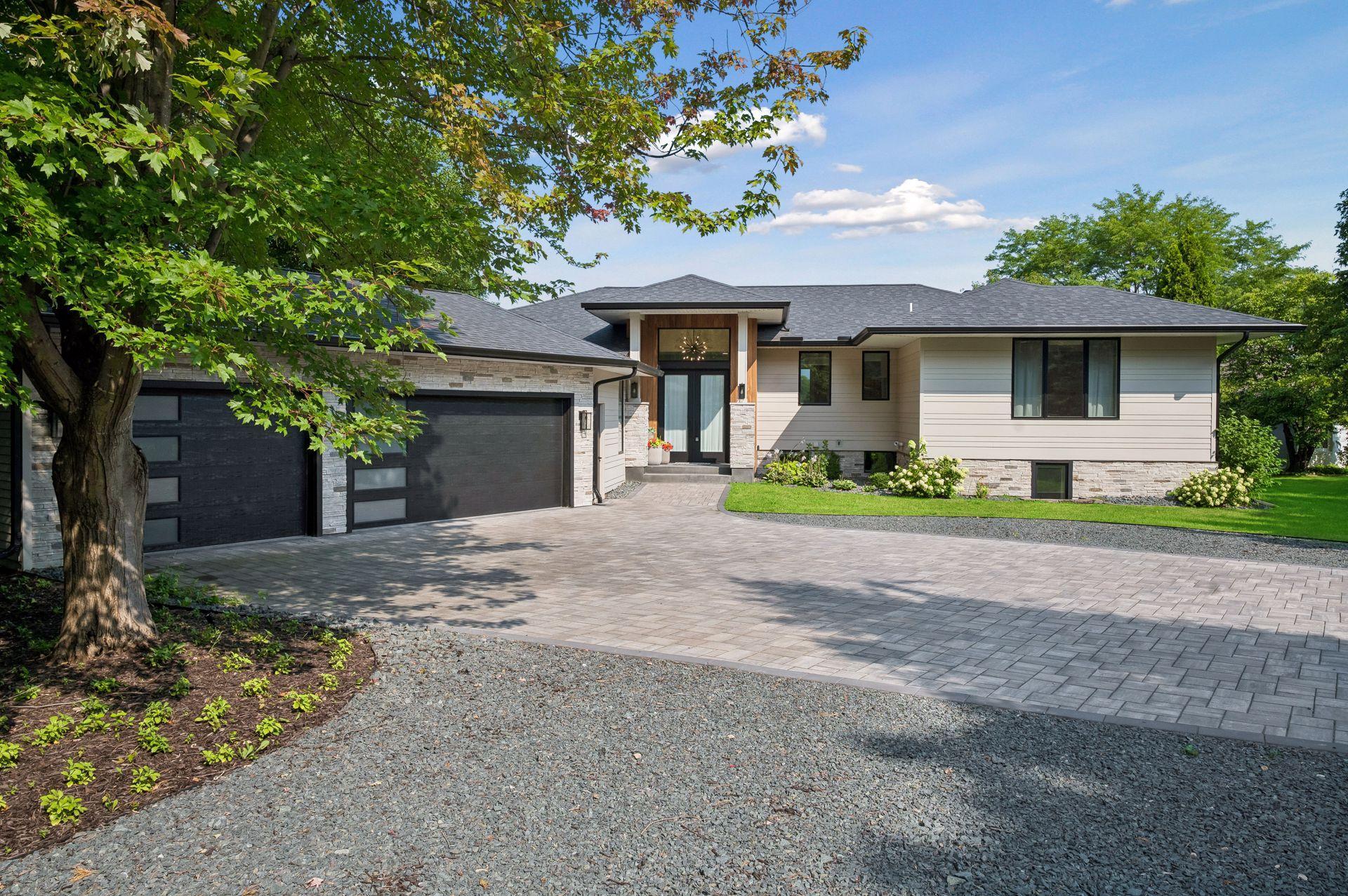 Paver stone driveway + Crushed rock parking areas