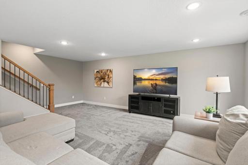 Large finished recreation area offers flexible space for a media room, game room or additional family room.