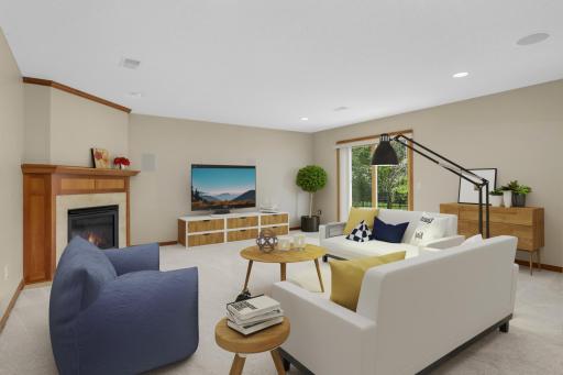 Virtually Staged Family Room With Gas Fireplace On The Walk-Out Level