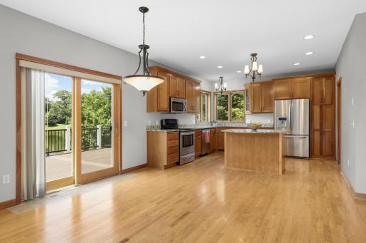 Sliding Door Access To Large Deck Overlooking The Back Yard