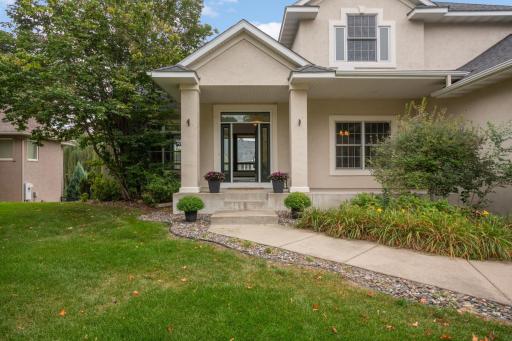 This Fabulous 2 Story Walk-Out Has A Good Sized Yard With A Gentle Slop In The Back, Offering Great Views of Your Beautiful Pondside Setting.