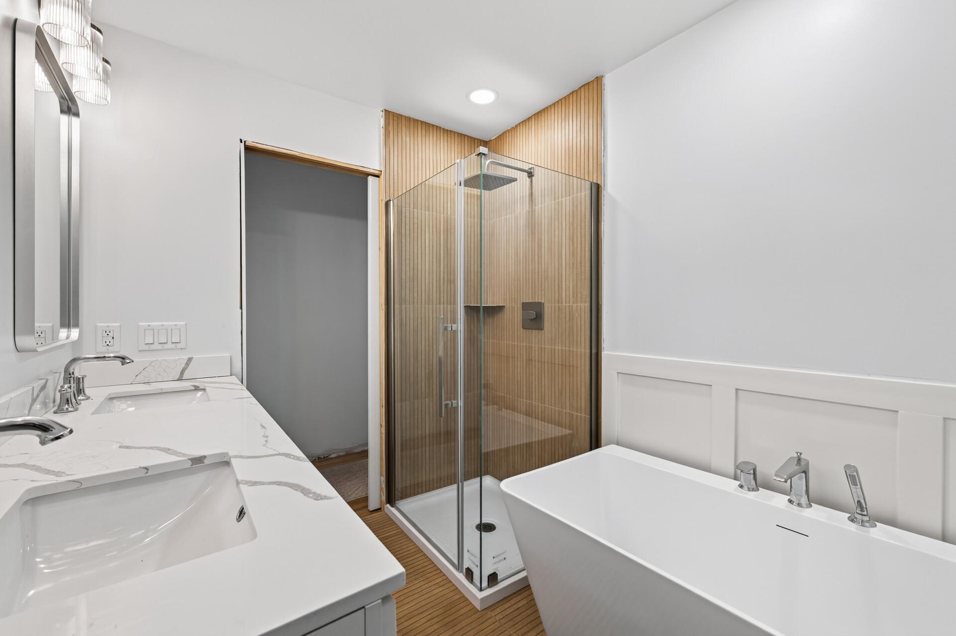 Main level bath (full) located just off primary bedroom